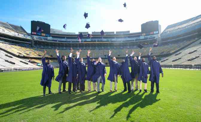 Graduates on Football Field